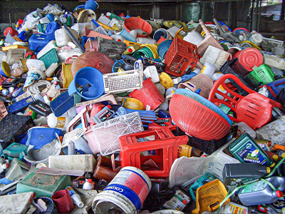 A mixed collection of discarded plastic items